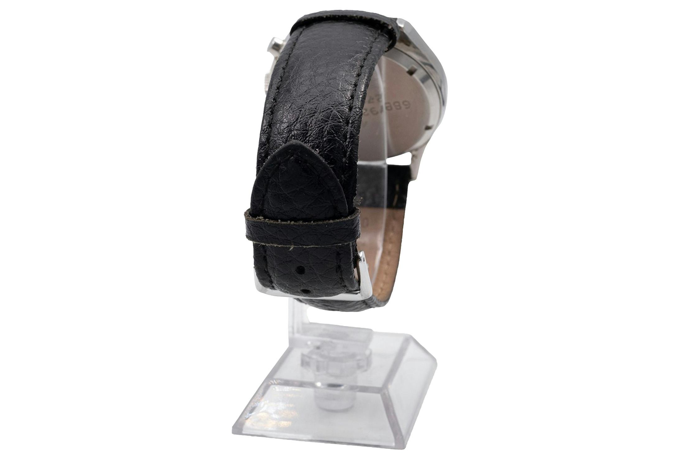 An Alpina-Gruen Techni-Quadron, A Universal Geneve "Eric Clapton" Ref 881101/01, A Cartier "Bebe Guillotine," And More