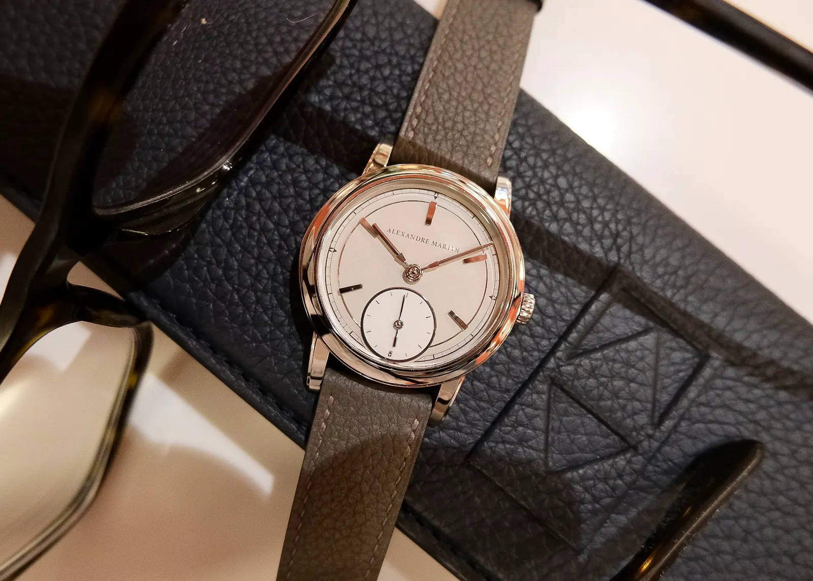 Alexandre Martin 1965 displayed on a leather surface