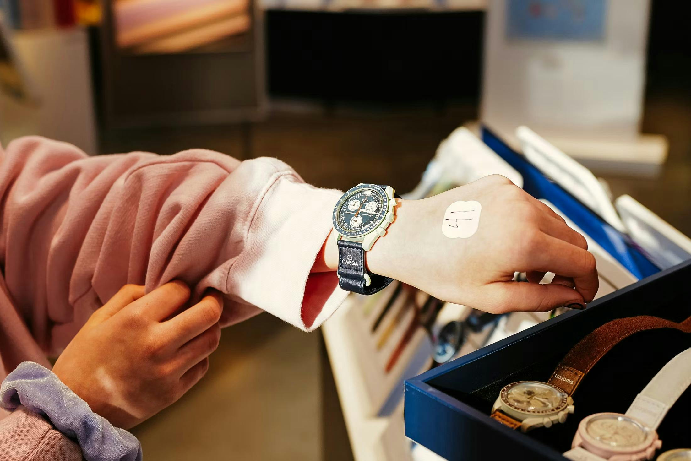 MoonSwatch on wrist