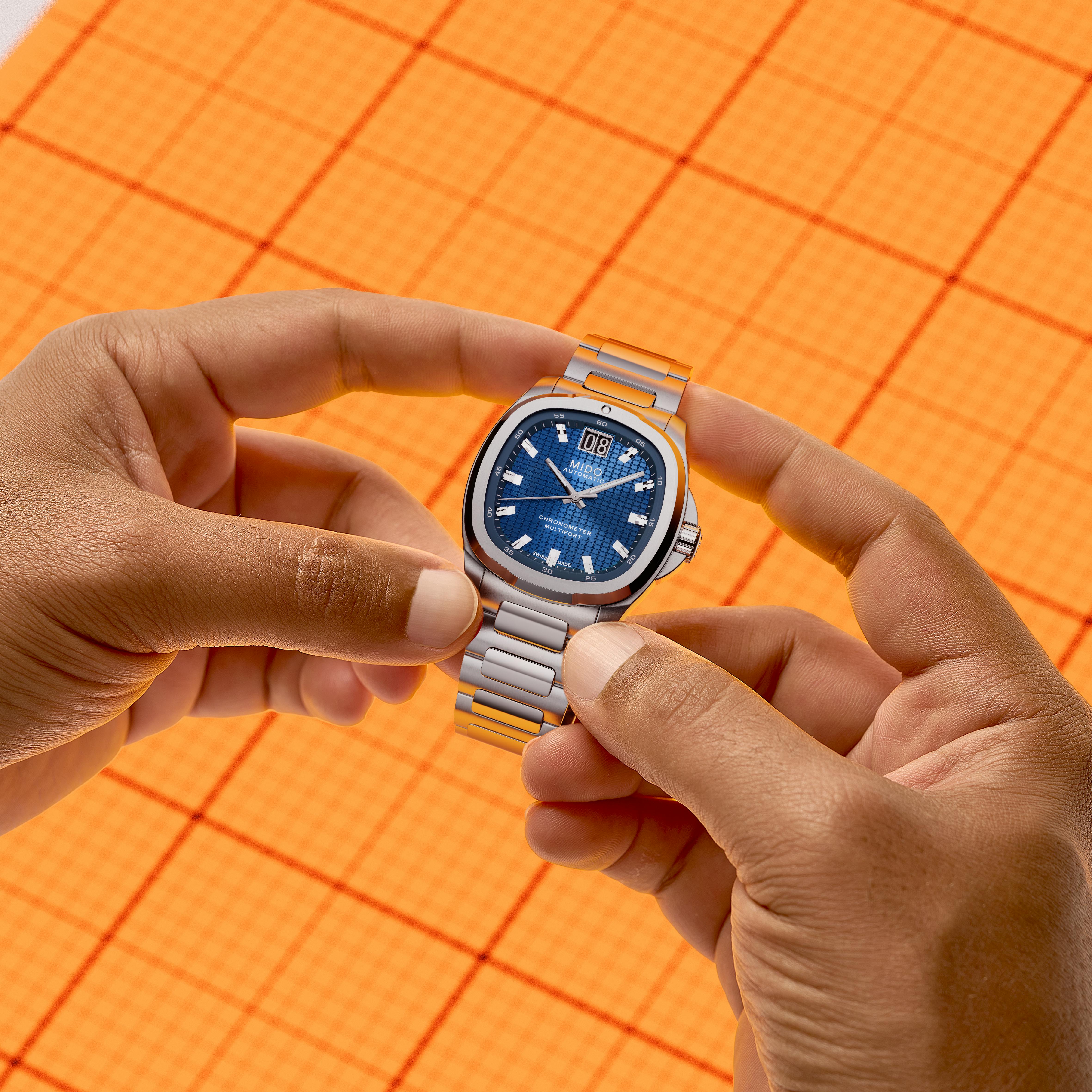 Mido Multifort TV Big Date Chronometer in hand